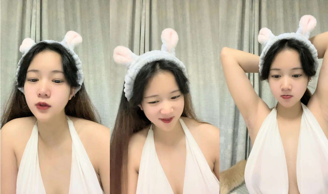 白色抹胸晚禮服，超短裙，很銷魂